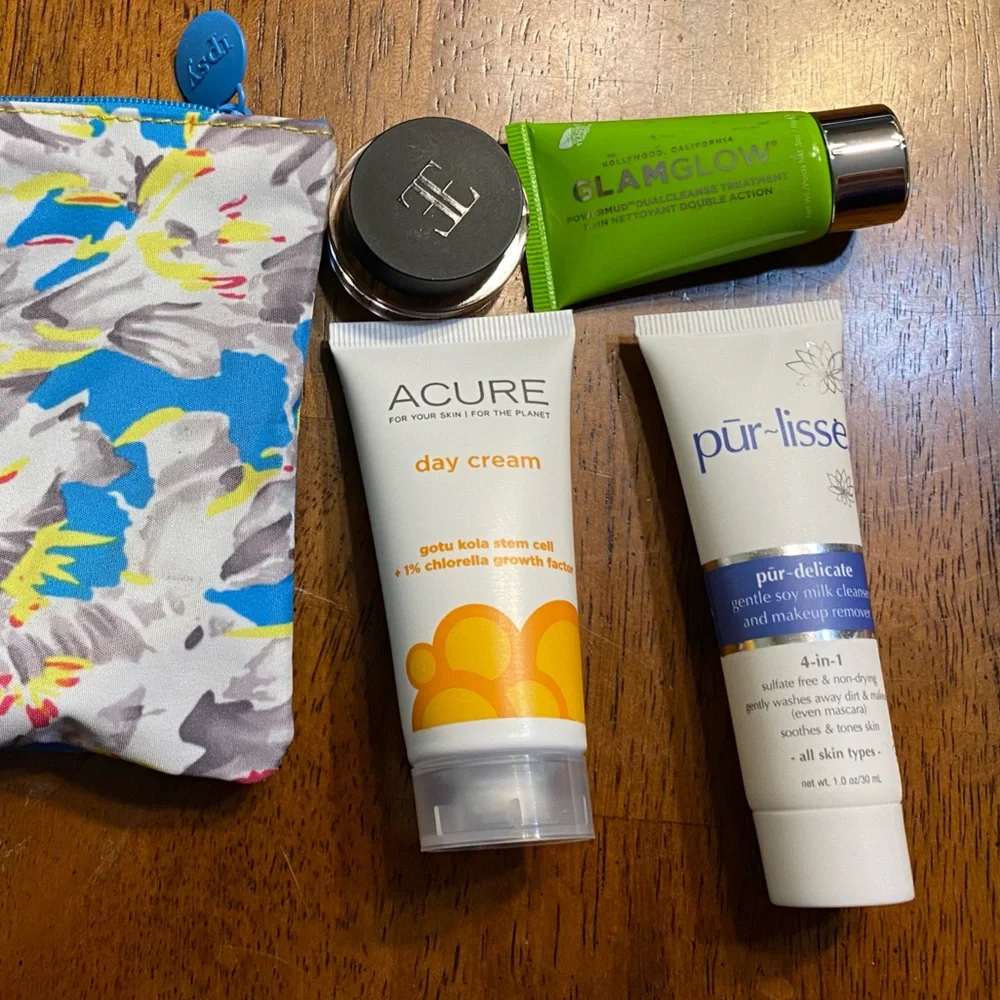 Ipsy makeup bags (3) with 14 different products. New, never opened.